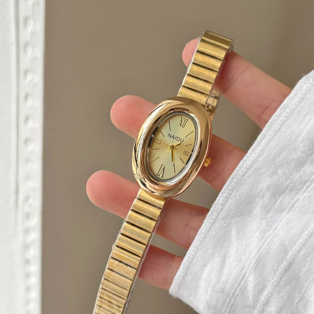 Reloj de cuarzo ovalado dorado - Wrap Ring Gold reseña y precio