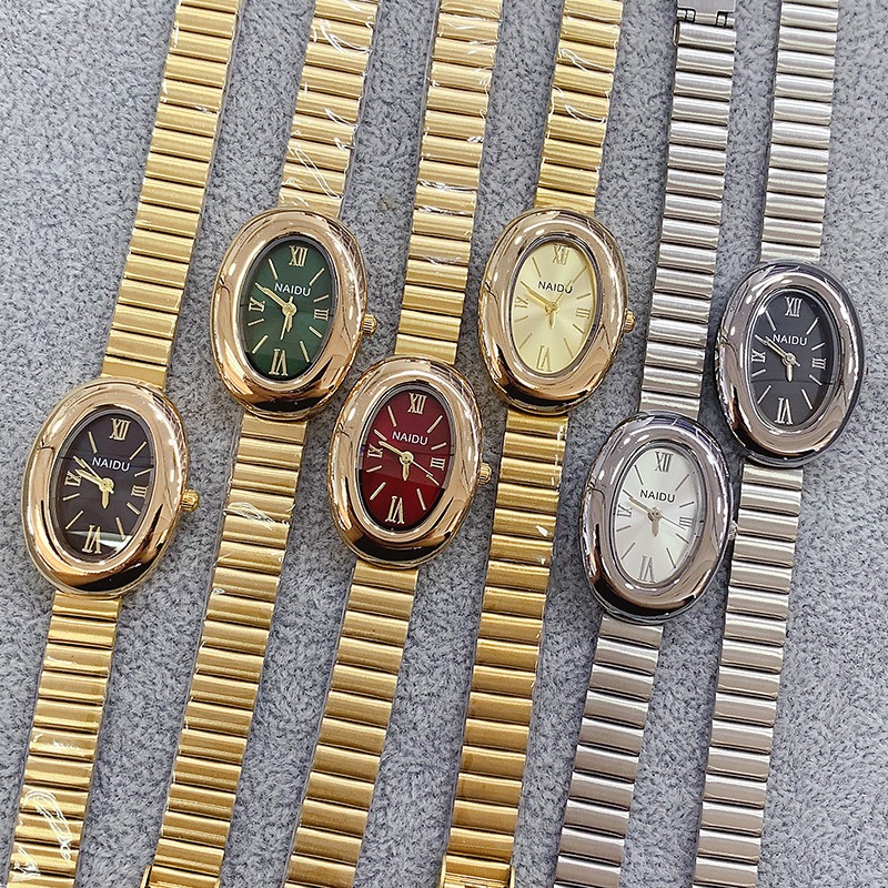 Reloj de cuarzo ovalado dorado - Wrap Ring Gold reseña y precio